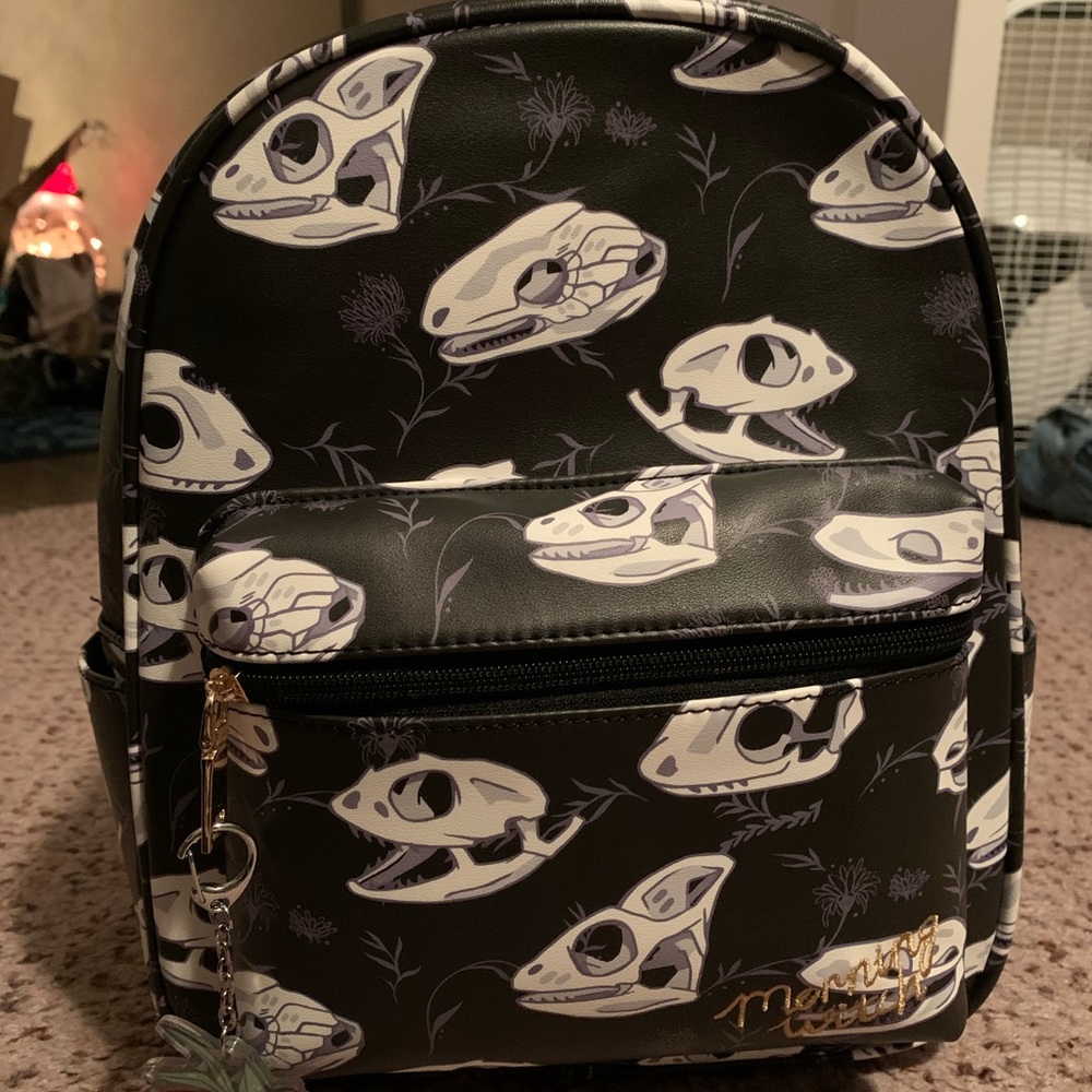 Morning Witch reptile skulls mini backpack.